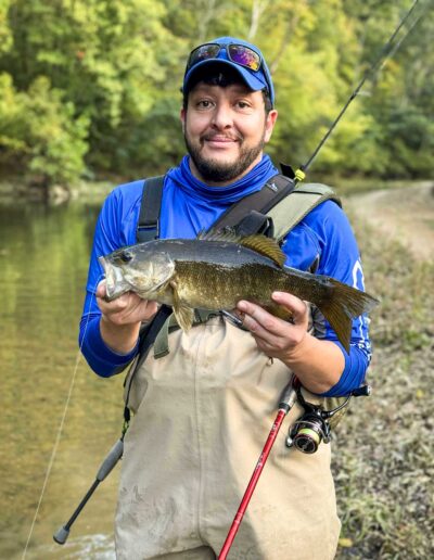 Israel with a nice Smallmouth Bass in the Harpeth River captured by Jason Coleman Photography on Mobile device